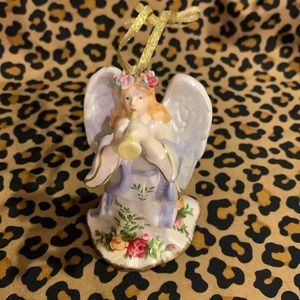 Ornament for the music/angel/rose lover.